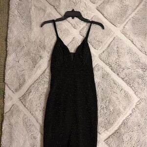 Size- Small
Black, Sparkly, V-Cut Mini Dress